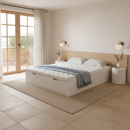 Base Sofy color blanco de Morfeo en dormitorio con cama vestida y textiles claros.