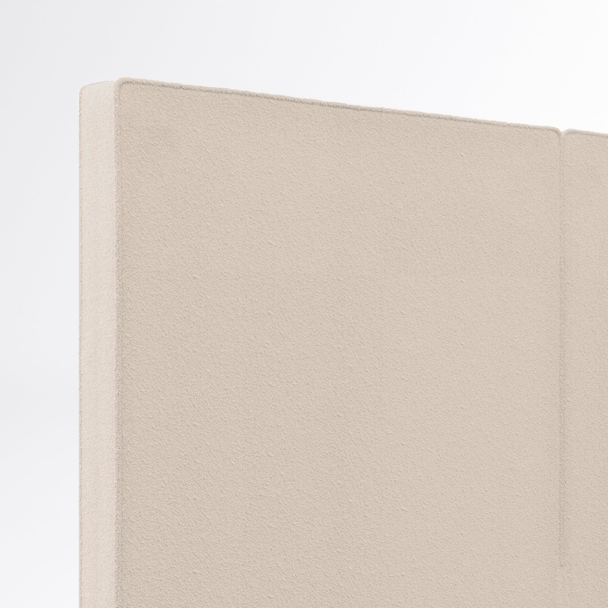 Detalle de la esquina del cabecero Aura beige de Morfeo sobre fondo blanco.
