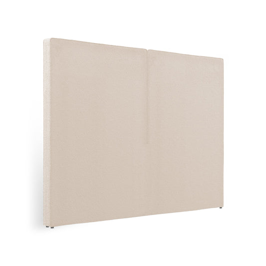 Vista lateral del cabecero Aura beige de Morfeo sobre fondo blanco.