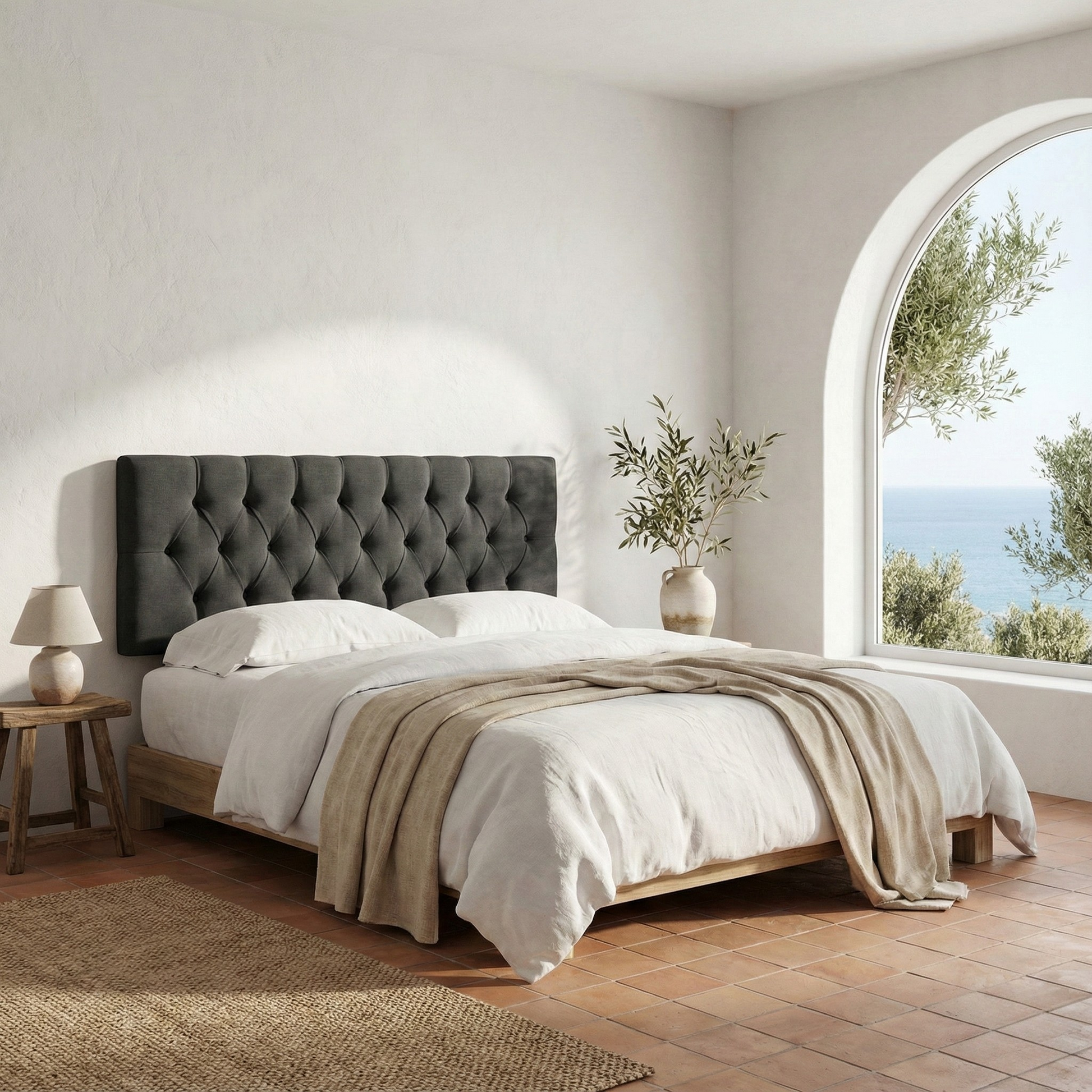 Cabecero Capy antracita de Morfeo en dormitorio luminoso con cama de madera.