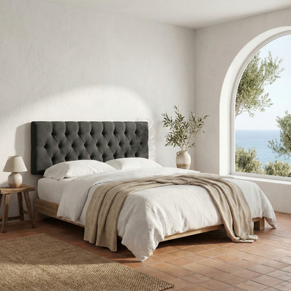 Cabecero Capy antracita de Morfeo en dormitorio luminoso con cama de madera.