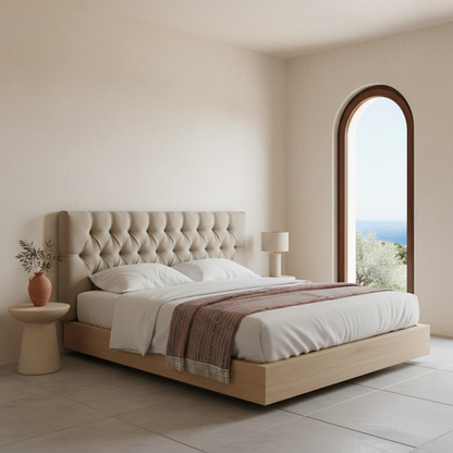 Cabecero Capy gris de Morfeo en dormitorio luminoso con cama de madera.