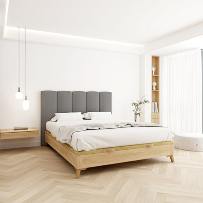 Cabecero Duna color gris de Morfeo en dormitorio moderno y luminoso con decoración natural.