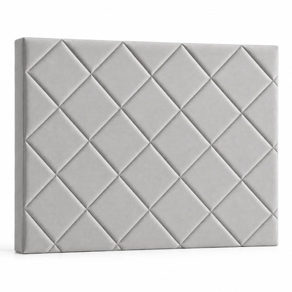 Cabecero Samos gris de Morfeo en perspectiva sobre fondo blanco, con el relieve de rombos marcado.