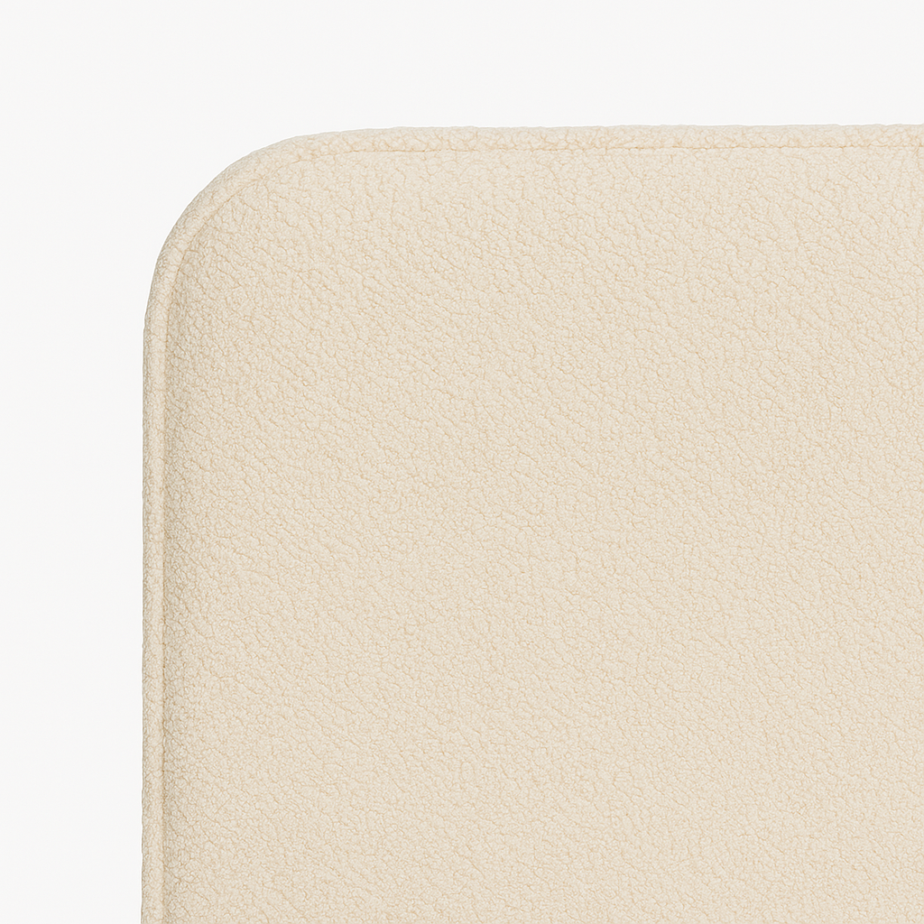 detalle del tejido bouclé beige del cabecero saona de morfeo con textura suave y mullida