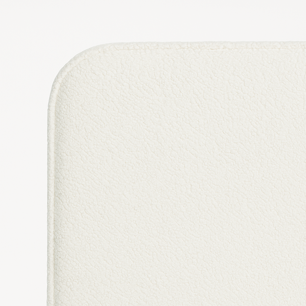 detalle del tejido bouclé blanco del cabecero saona de morfeo con textura suave y mullida