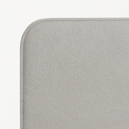 detalle del tejido bouclé gris del cabecero saona de morfeo con textura suave y mullida