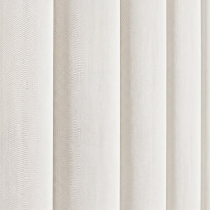 Detalle de los canales verticales acolchados del cabecero tapizado Tasos blanco de Morfeo. Tejido antimanchas, fabricado en España.