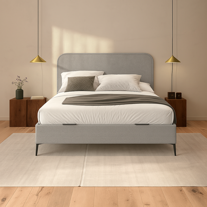 Canapé Saona color gris de Morfeo en ambiente de dormitorio con textiles claros.