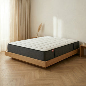 Colchón Altus de Morfeo en dormitorio minimalista con cama y decoración en tonos neutros.