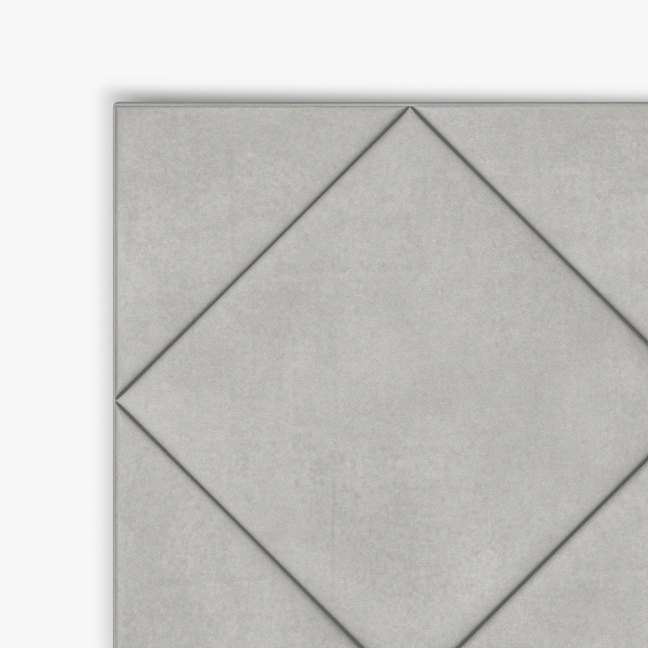 Detalle de la esquina con diseño de rombos del cabecero Samos gris de Morfeo.