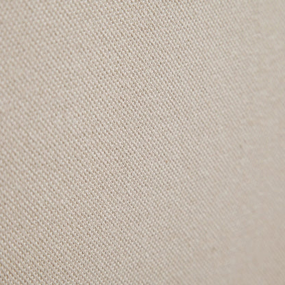 Detalle de la textura de tela beige del cabecero Lin de Morfeo.