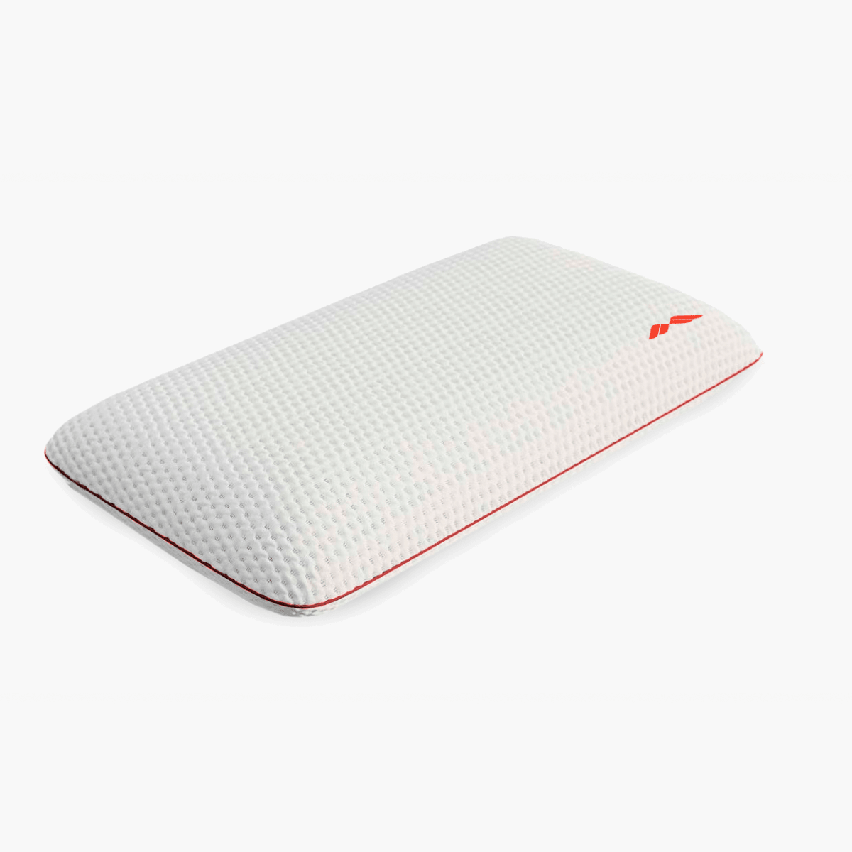 Almohada viscoelástica Adapta de Morfeo en perspectiva sobre fondo blanco, con funda blanca y ribete rojo.