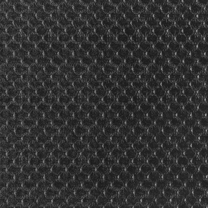 Primer plano de la textura perforada del tapizado negro del cabecero Alba de Morfeo.
