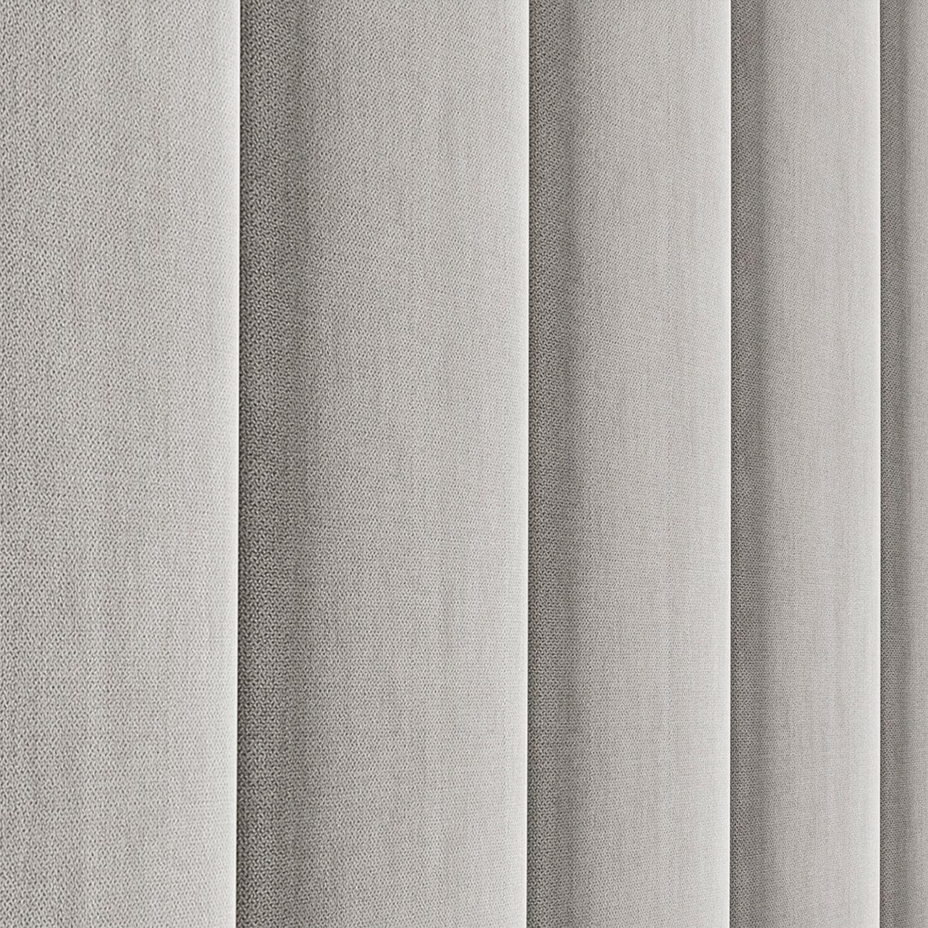 Detalle lateral del cabecero Tasos color gris de Morfeo con tapizado acolchado.