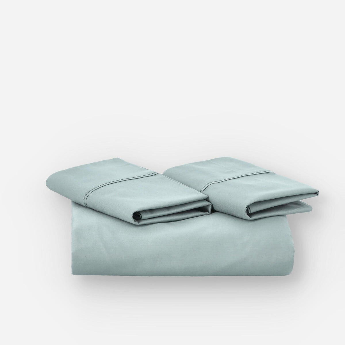 Fundas de edredón EcoPercal aguamarina de Morfeo, conjunto doblado en perspectiva sobre fondo blanco.