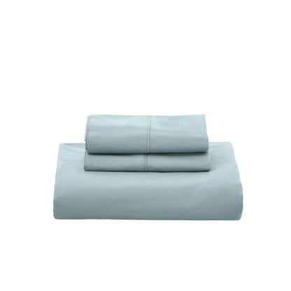 Fundas de edredón EcoPercal aguamarina de Morfeo dobladas con fundas de almohada, vista frontal.