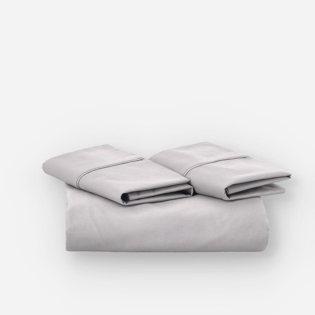 Fundas de edredón EcoPercal gris de Morfeo, conjunto doblado en perspectiva sobre fondo blanco.
