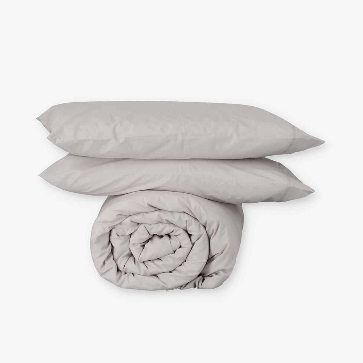 Fundas de edredón EcoPercal gris de Morfeo: funda nórdica enrollada con dos fundas de almohada.