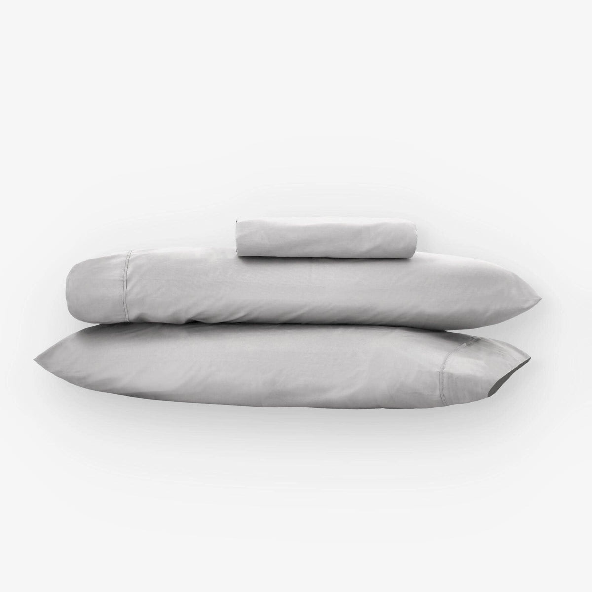 Fundas de edredón EcoPercal gris de Morfeo: dos fundas de almohada apiladas sobre fondo blanco.